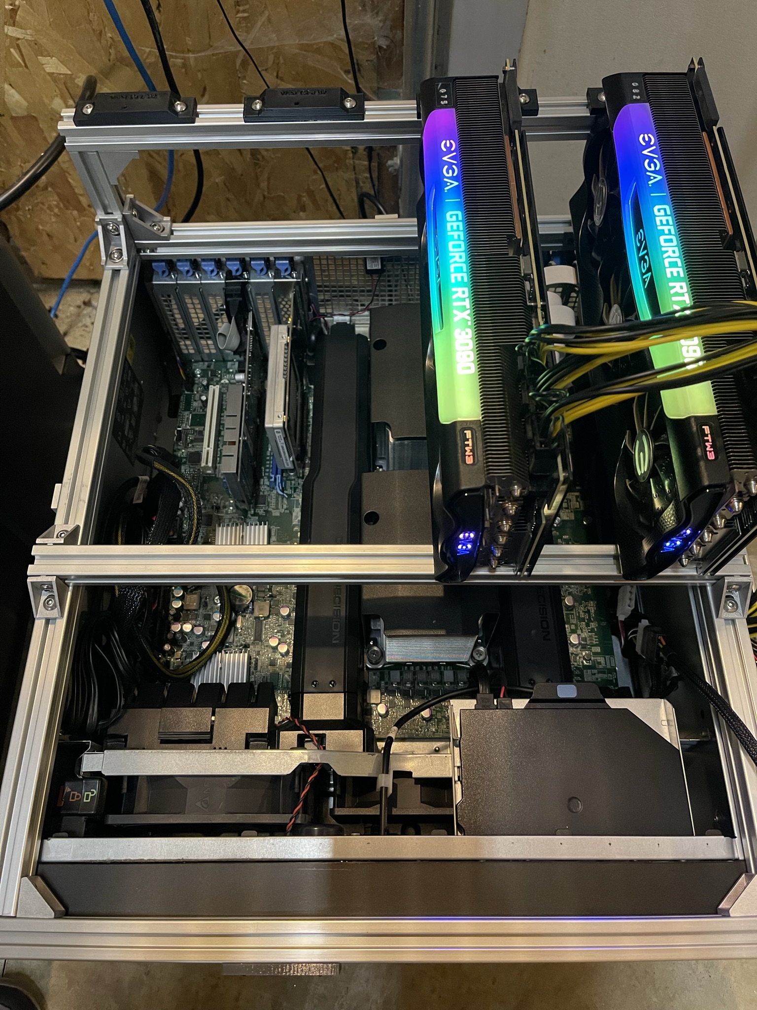 A pair of EVGA RTX 3090 Ultra FTW3 GPUs received power from an external server PSU.