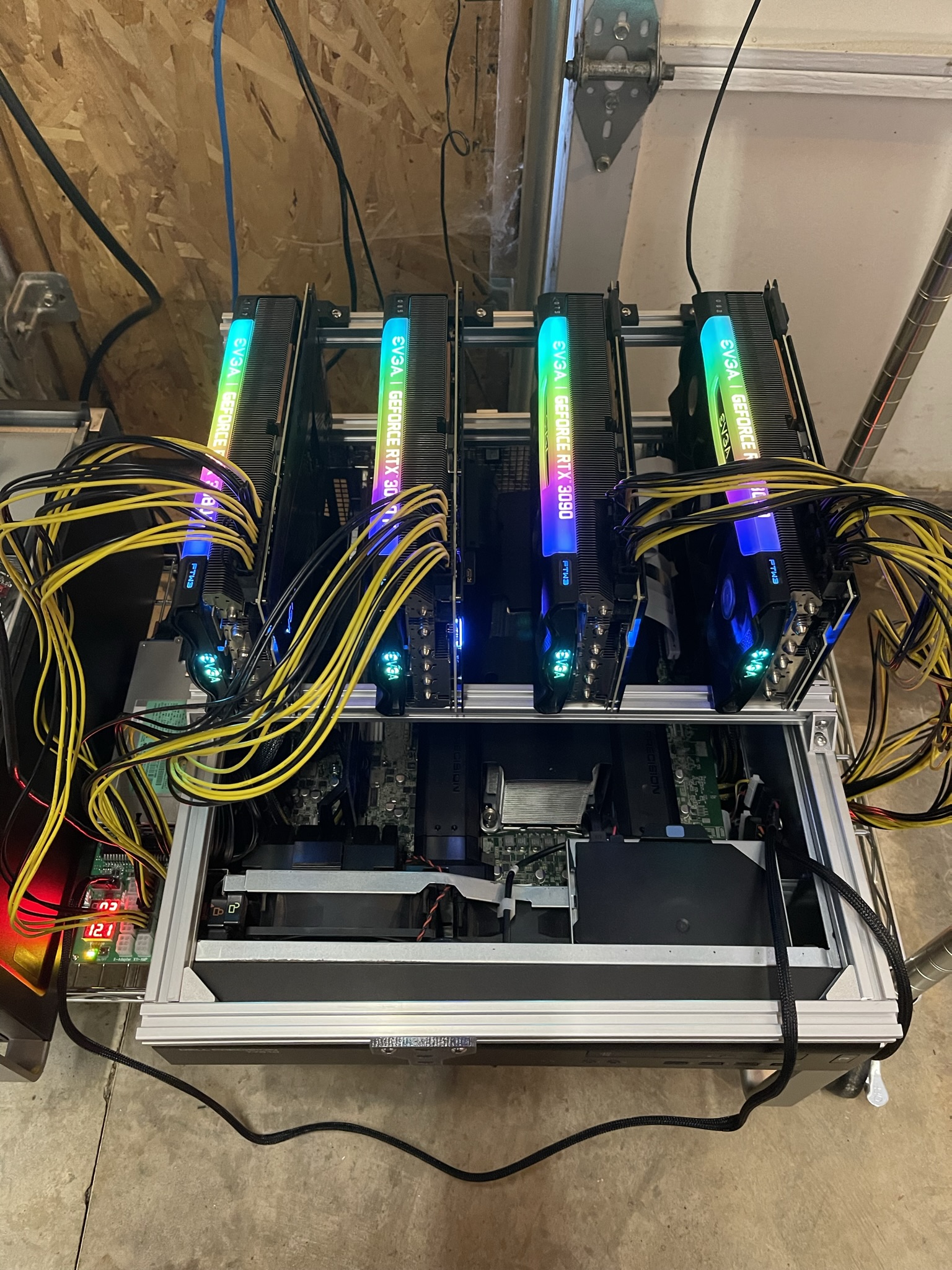 The system can support up to four 3-slot GPUs with enough space for cooling fans. The two external PSUs for GPUs turn on when the system is powered on.